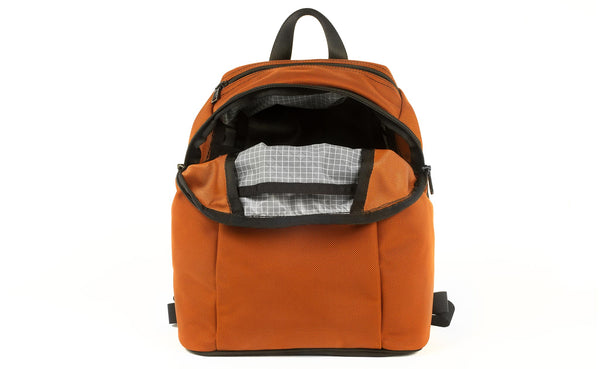 The Sprout in Burnt Orange 1050 Ballistic with Northwest Sky 200 Halcyon interior.